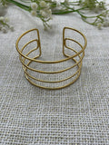 PULSERA RIGIDA LINEAS VERTICALES