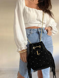 BOLSO SACO+TACHAS DORADAS
