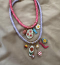 PACK 2 COLLARES LILA FUCSIA EGG