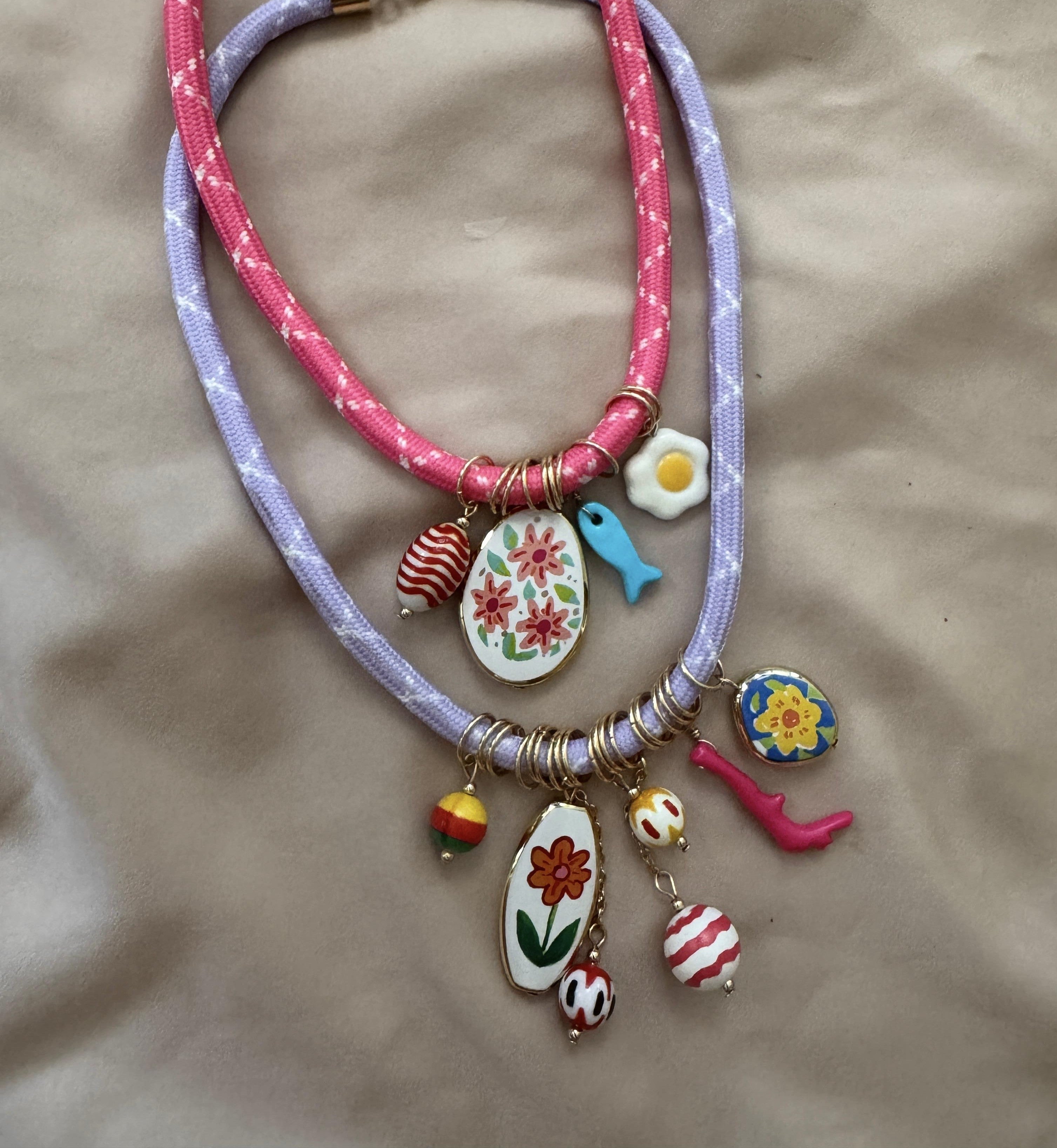 PACK 2 COLLARES LILA FUCSIA EGG