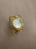 ANILLO DORADO PIEDRA BLANCA REDONDA