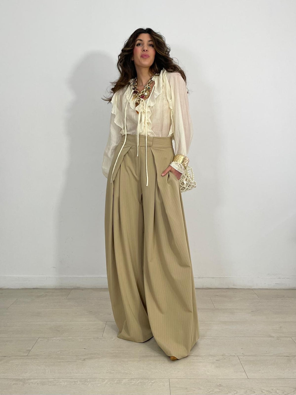 PANTALON PLIEGUES Y RAYAS