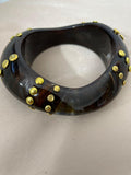 PULSERA MARRON + TACHITAS DORADAS