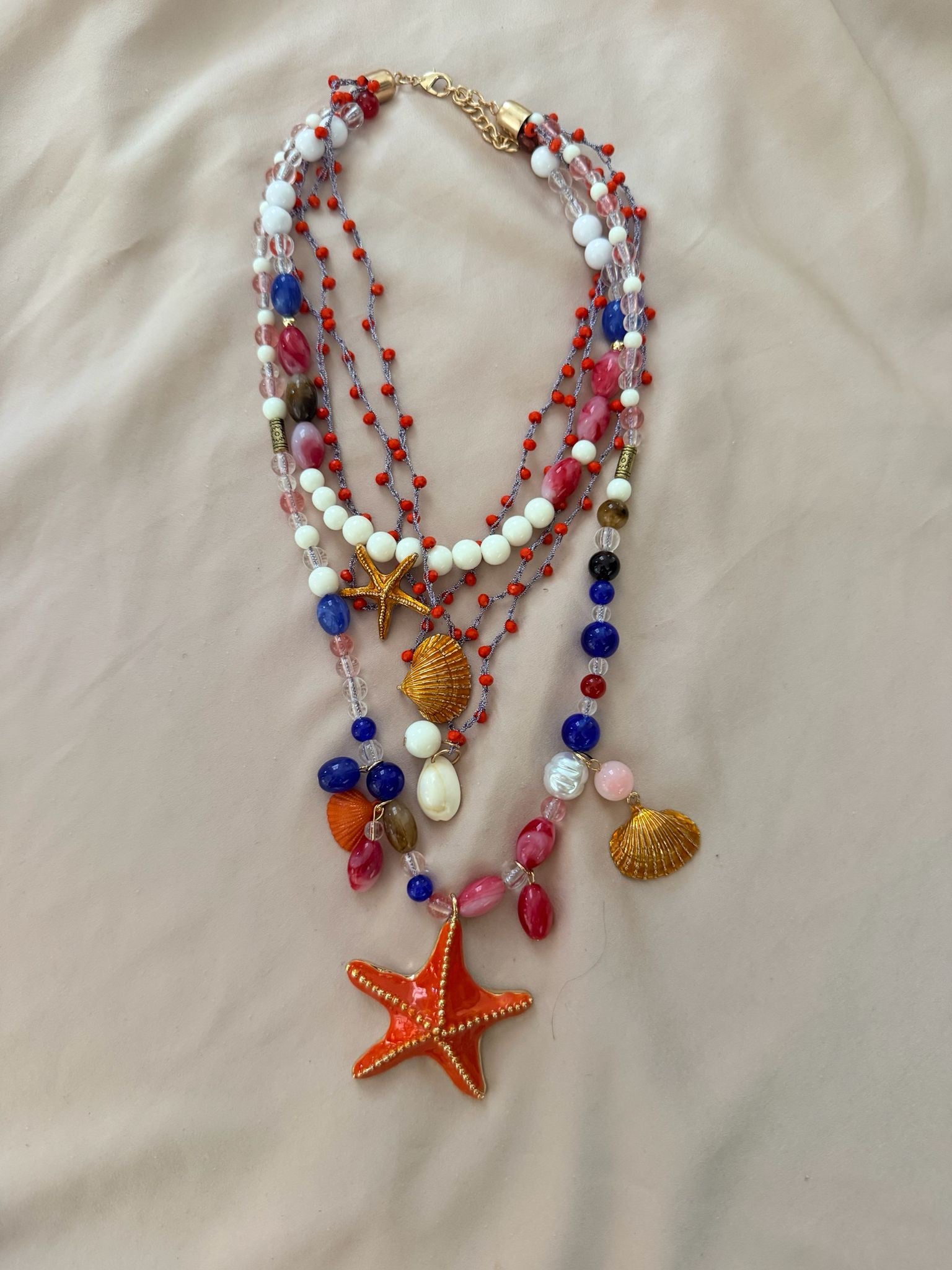 COLLAR ESTRELLA DE MAR NARANJA