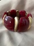 PULSERA ELÁSTICA GRANATE Y DORADA