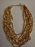 COLLAR MULTICUENTAS DORADAS