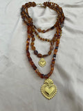 COLLAR CAREY CORAZONES DORADOS
