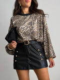 MINI FALDA PANTALÓN EFECTO PIEL BOTONES