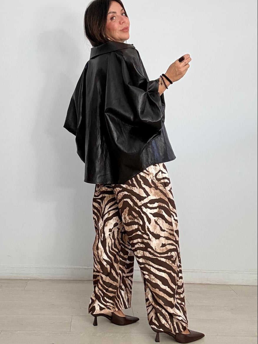 BLUSA OVERSIZE EFECTO PIEL ABOTONADA