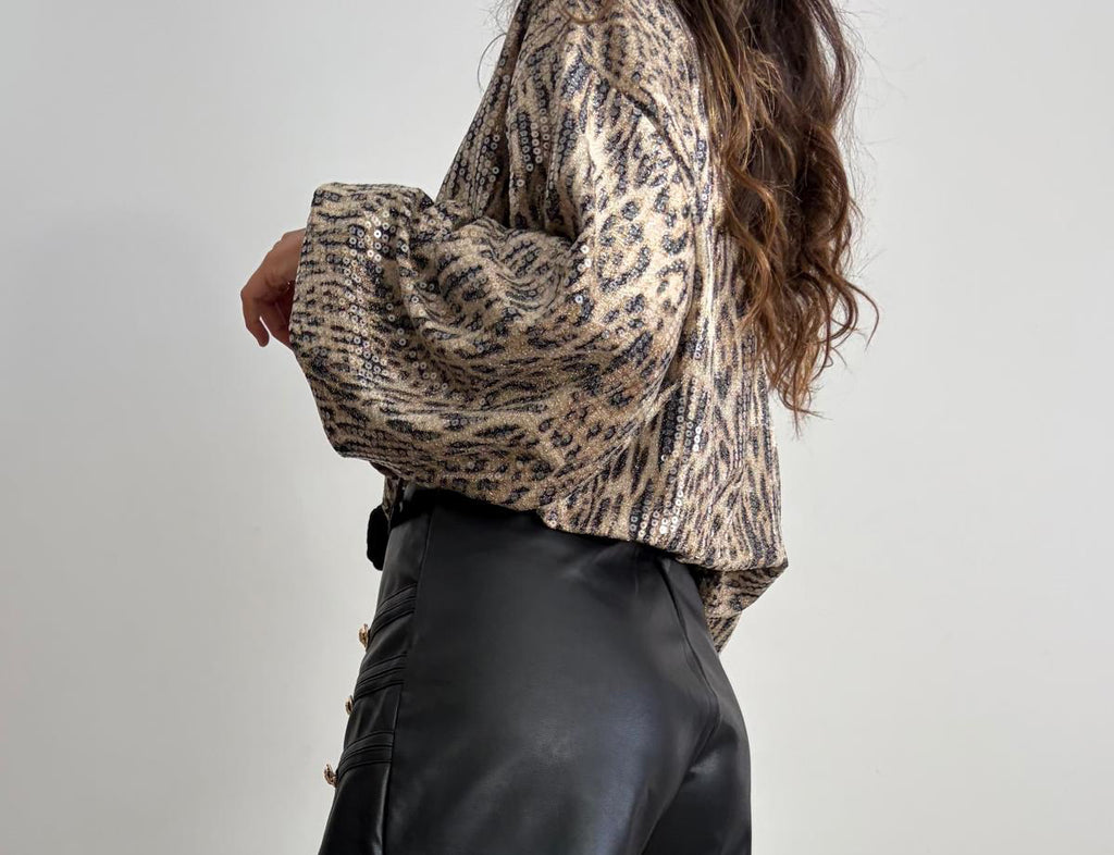 MINI FALDA PANTALÓN EFECTO PIEL BOTONES