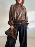 BOLSO CLUTCH LEOPARDO